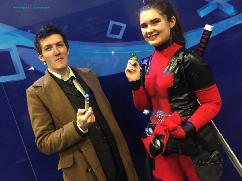 An interesting Cosplaying couple.... David Tenant 10th Doctor with a female Deadpool..